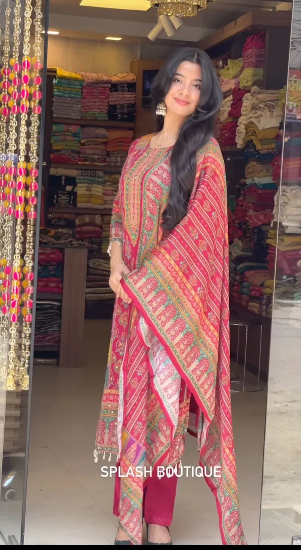 Wrap_yourself_in_elegance_this_festive_with_our_DIYA_PINK__READYMADE_Suit_,_featuring_intricate_Schiffli_MIRROR_AND_HAND_WORKS_and_thread_kodi._Perfect_for_celebrating_the_bond_of_love._A_blend_of_tradition_and_modernity,_just_like_the_bond_you_share