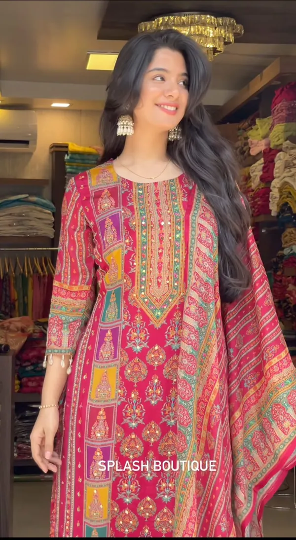 Wrap_yourself_in_elegance_this_festive_with_our_DIYA_PINK__READYMADE_Suit_,_featuring_intricate_Schiffli_MIRROR_AND_HAND_WORKS_and_thread_kodi._Perfect_for_celebrating_the_bond_of_love._A_blend_of_tradition_and_modernity,_just_like_the_bond_you_share