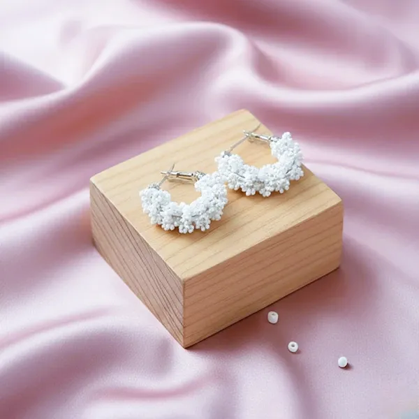 Handcrafted_White_Beaded_Hoop_Earrings_?_Chic_Artisan_Statement