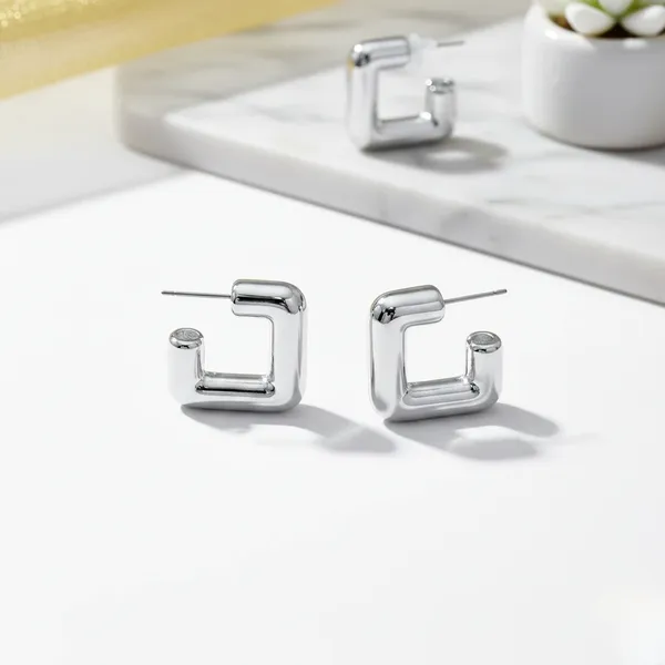 Modern_Geometric_Silver_Hoop_Earrings_?_Sleek_Statement_Style