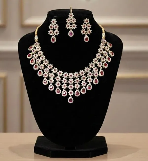 CRUSSTIQUE_GOLD�_Indian_Bridal_Jewellery_Set,_Gold_Plated_with_Red_Stones,_Necklace_Earrings_Maang_Tikka,_American_Diamond,_Wedding_Collection