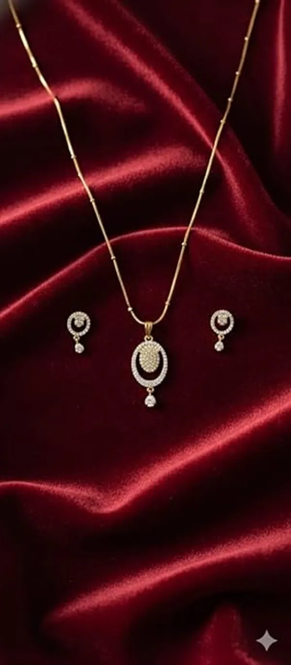 CRUSSTIQUE_GOLD�_Gold_Plated_Pendant_Necklace_and_Earrings_Set,_Cubic_Zirconia,_Concentric_Oval_Design_with_Drop_Detail