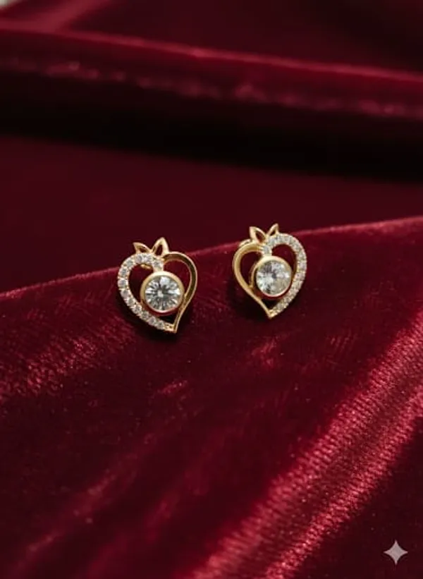Gold_Heart_Shaped_Stud_Earrings_with_Crystal_Center_Stone_and_Bow_Accent,_Elegant_Design_with_Gift_Box