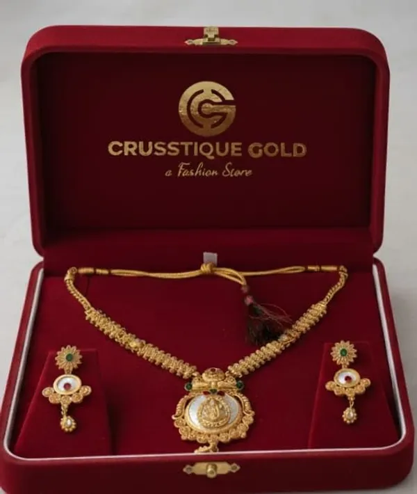CRUSSTIQUE_GOLD_Traditional_Necklace_Set_for_Women_with_Antique_Finish,_Green_and_Red_Stone_Embellishments,_Includes_Matching_Earrings_for_Bridal_and_Festive_Occasions