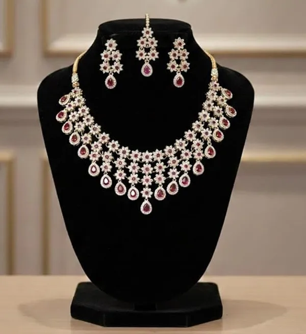 CRUSSTIQUE_GOLD�_Indian_Bridal_Necklace_Set_with_Earrings_and_Maang_Tikka,_Gold_Plated,_Traditional_Wedding_Jewellery_(Pink)