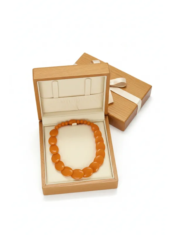 CRUSSTIQUE_GOLD_Vibrant_Tangerine_Orange_Oval_Bead_Statement_Necklace_for_Women