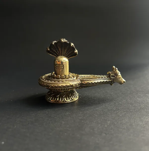 Golden_Finish_Pure_Brass_Shivling_Statue_(3_Inch)