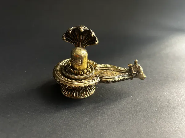 Golden_Finish_Pure_Brass_Shivling_Statue_(3_Inch)