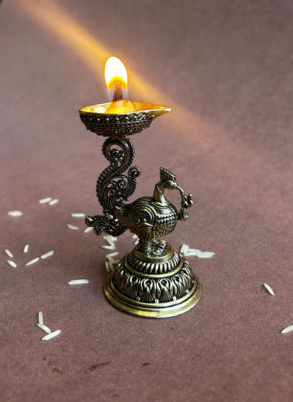 Golden_Finish_Pure_Brass_Peacock_Pooja_Diya_(3.5_Inch)