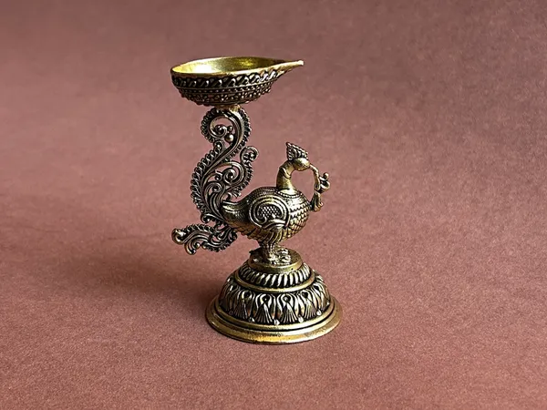 Golden_Finish_Pure_Brass_Peacock_Pooja_Diya_(3.5_Inch)