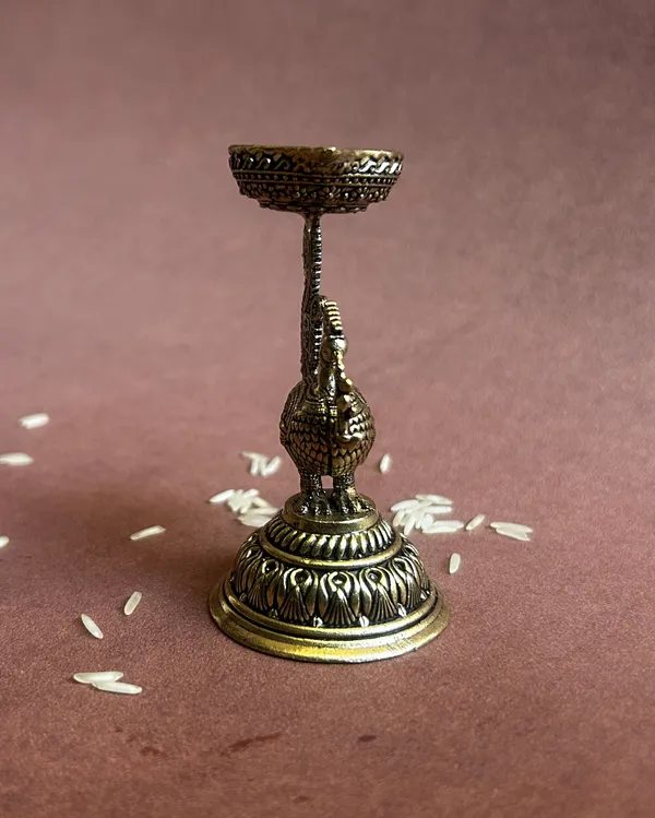 Golden_Finish_Pure_Brass_Peacock_Pooja_Diya_(3.5_Inch)