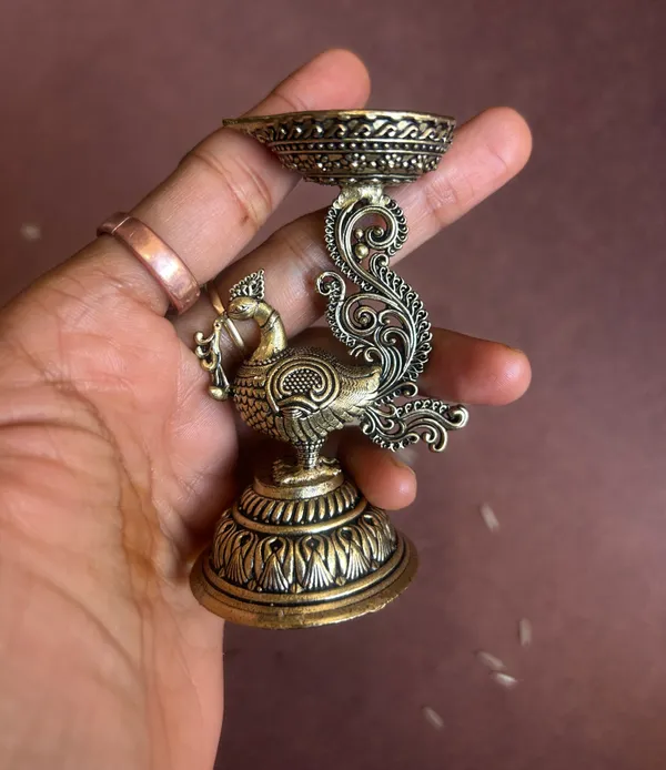 Golden_Finish_Pure_Brass_Peacock_Pooja_Diya_(3.5_Inch)