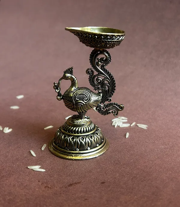Golden_Finish_Pure_Brass_Peacock_Pooja_Diya_(3.5_Inch)