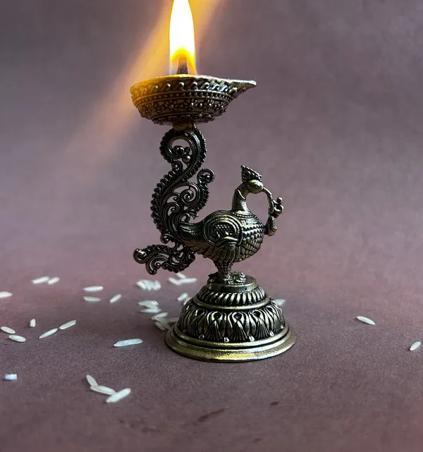 Golden_Finish_Pure_Brass_Peacock_Pooja_Diya_(3.5_Inch)