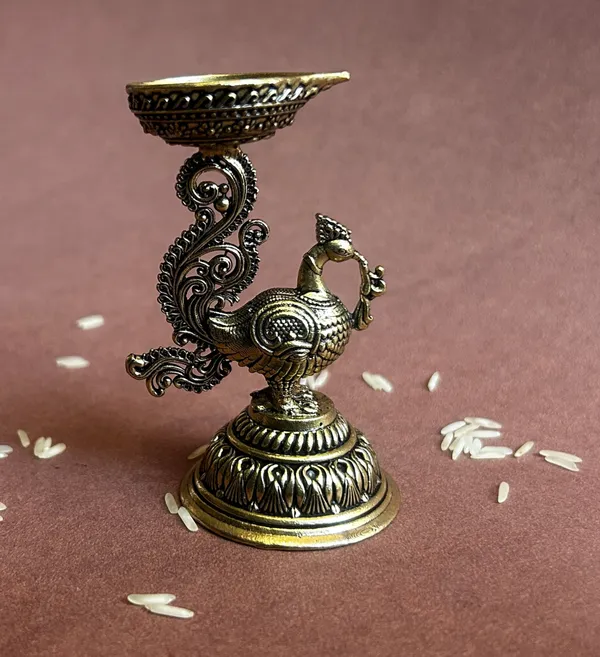 Golden_Finish_Pure_Brass_Peacock_Pooja_Diya_(3.5_Inch)