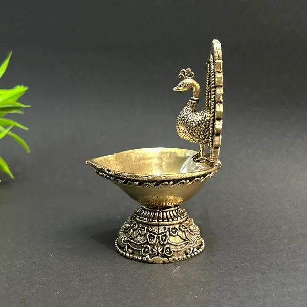 Golden_Finish_Pure_Brass_Peacock_Pooja_Diya_(4_Inch)