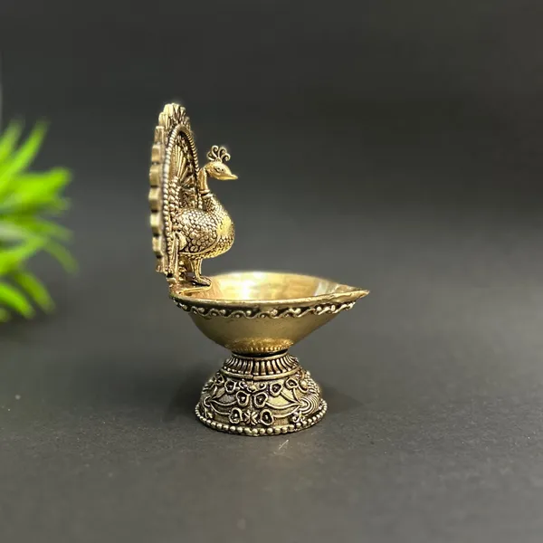 Golden_Finish_Pure_Brass_Peacock_Pooja_Diya_(4_Inch)