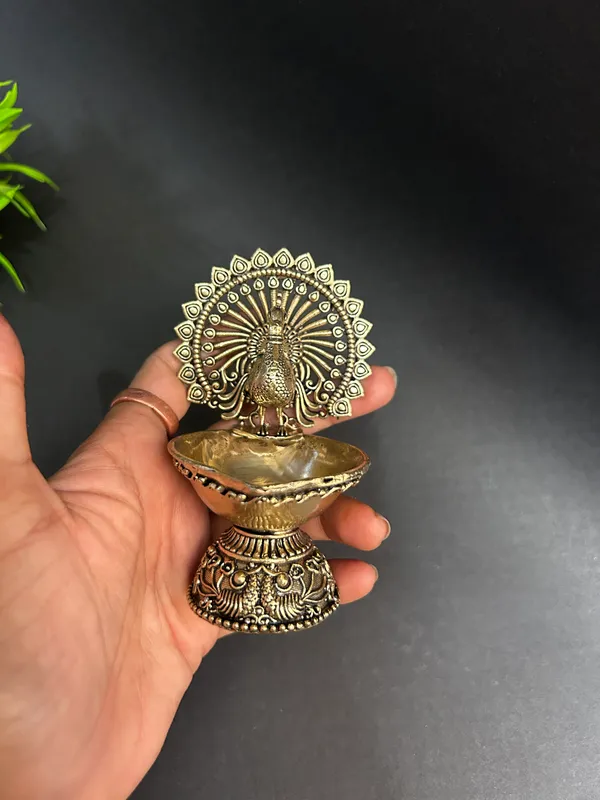 Golden_Finish_Pure_Brass_Peacock_Pooja_Diya_(4_Inch)