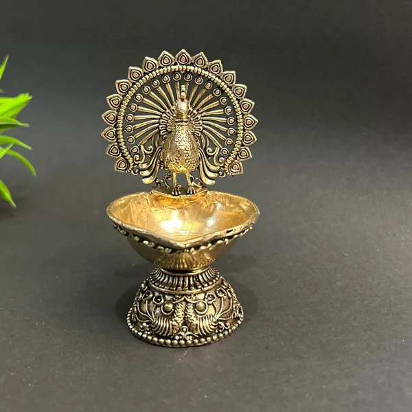 Golden_Finish_Pure_Brass_Peacock_Pooja_Diya_(4_Inch)