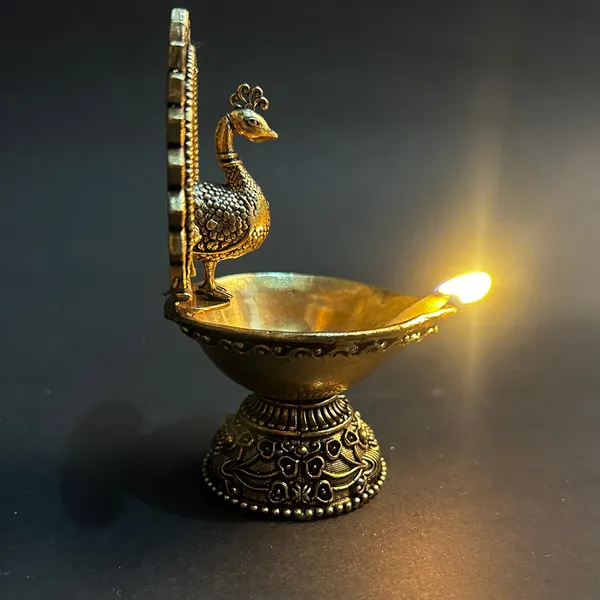 Golden_Finish_Pure_Brass_Peacock_Pooja_Diya_(4_Inch)