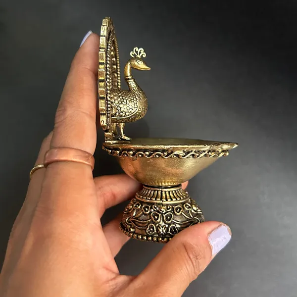 Golden_Finish_Pure_Brass_Peacock_Pooja_Diya_(4_Inch)