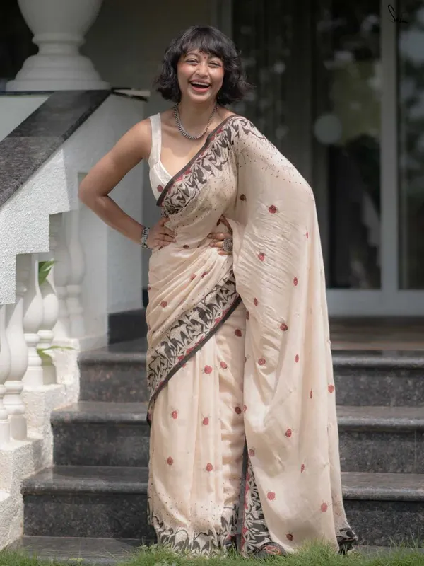 Cream_Elegant_Design_Embroidered_Net_Saree_For_Women