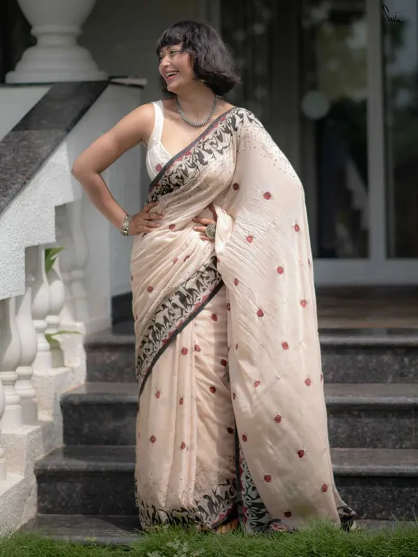 Cream_Elegant_Design_Embroidered_Net_Saree_For_Women