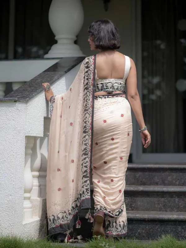 Cream_Elegant_Design_Embroidered_Net_Saree_For_Women