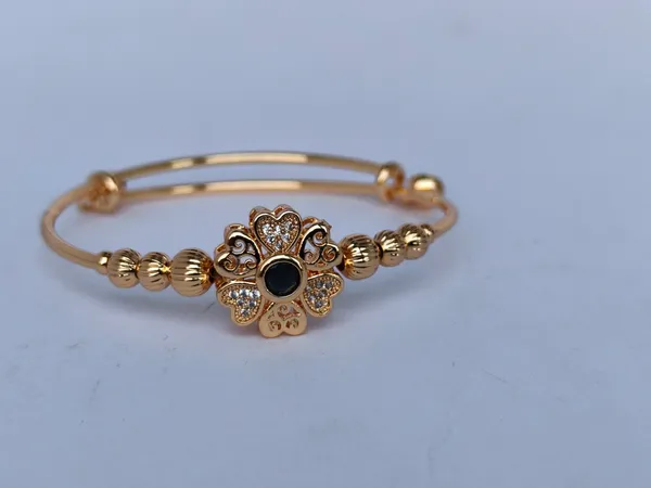 Ritika_Gold_Plated_Anti_Tarnish_Flower_Bracelet