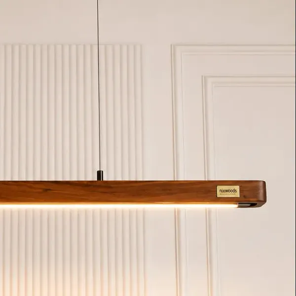 Rosewood_Pendant_Light_–_Hollow_Curved_Hanging_Light_For_Modern_Interiors