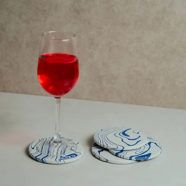 Pack_Of_4_Off_White_&_Blue_Polished_Vein_Pattern_Coaster_For_Kitchen