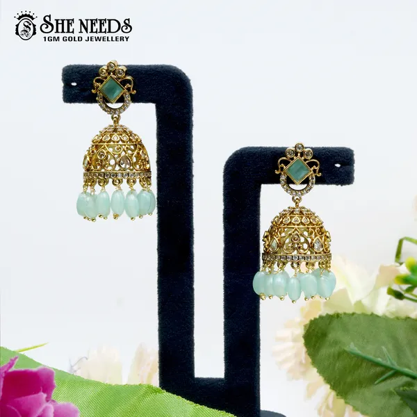 Light_Green_Royal_Cutwork_Temple_Gold_Plated_Jhumka_Earrings_For_Women