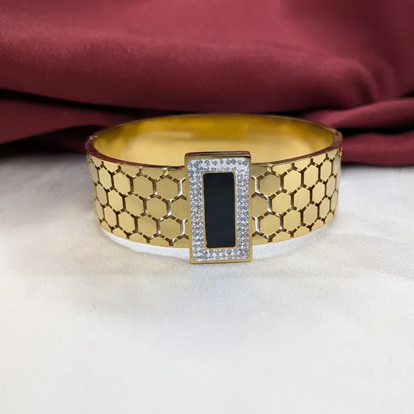 Gold_Finish_Geometric_Cutwork_Cuff_Bracelet_with_Rectangular_Enamel_Centerpiece
