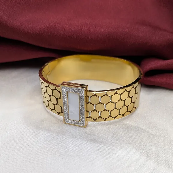 Gold_Finish_Geometric_Cutwork_Cuff_Bracelet_with_Rectangular_Enamel_Centerpiece