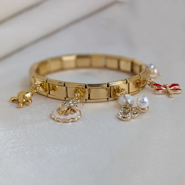 Playful_Gold_Plated_Charm_Bracelet_with_Pearl,_Dragonfly_&_Bow_Charms_Accents