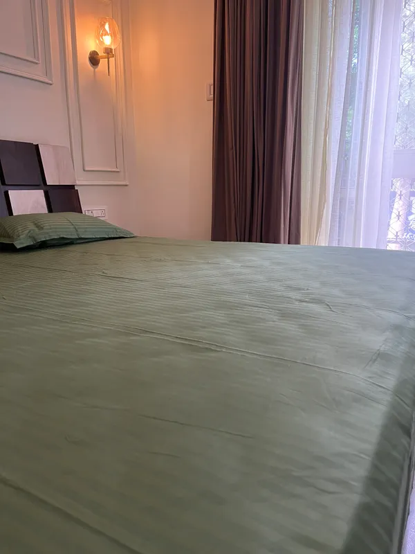 Green_Double_Bed_Sheet_With_Pillows