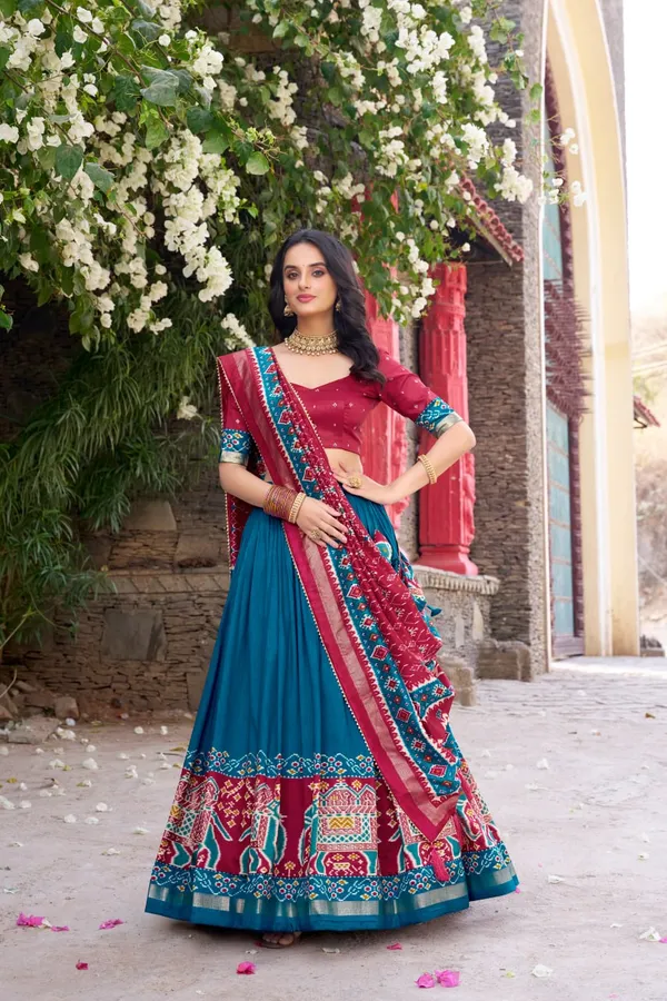 Infuse_Your_Wardrobe_with_Southern_Grace—Tussar_Silk_Kalamkari_Print_Lehenga_Choli_Featuring_a_Sophisticated_Foil_Work_Border