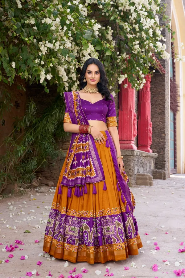Infuse_Your_Wardrobe_with_Southern_Grace—Tussar_Silk_Kalamkari_Print_Lehenga_Choli_Featuring_a_Sophisticated_Foil_Work_Border