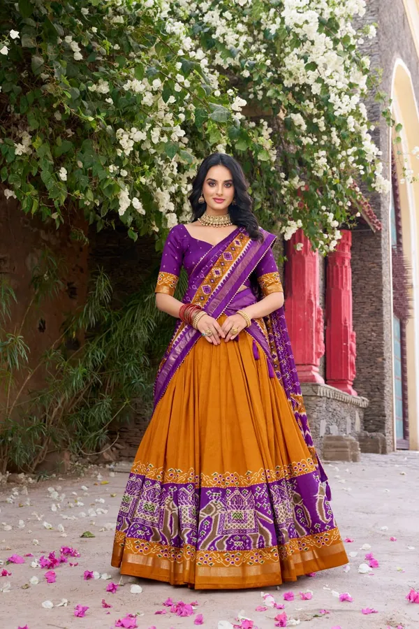 Infuse_Your_Wardrobe_with_Southern_Grace—Tussar_Silk_Kalamkari_Print_Lehenga_Choli_Featuring_a_Sophisticated_Foil_Work_Border