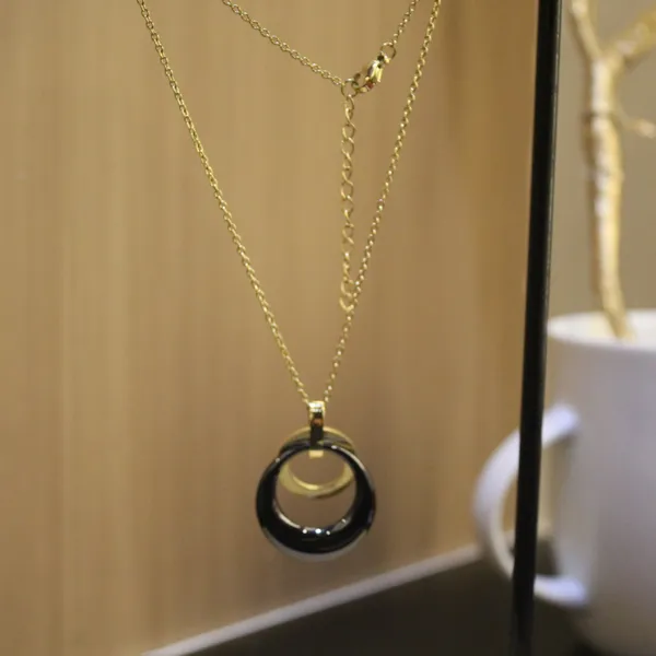 Gold_&_Black_Premium_Brass_And_American_Diamond_Neck_Pendant_For_Women
