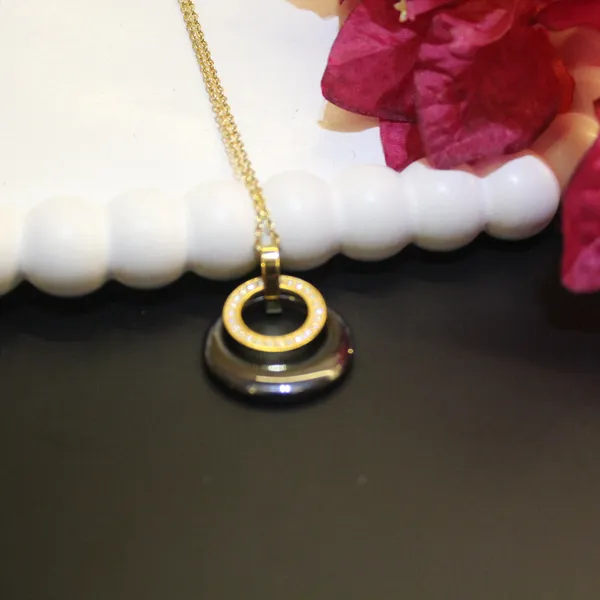 Gold_&_Black_Premium_Brass_And_American_Diamond_Neck_Pendant_For_Women