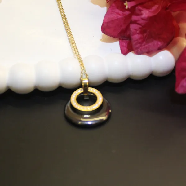 Gold_&_Black_Premium_Brass_And_American_Diamond_Neck_Pendant_For_Women