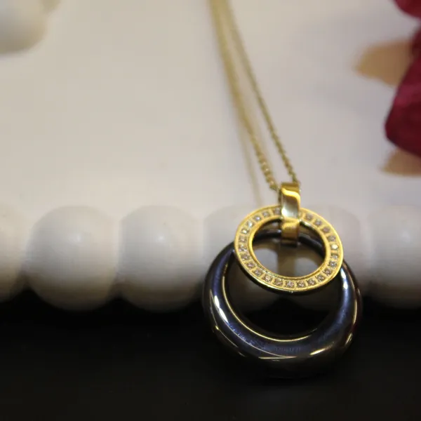 Gold_&_Black_Premium_Brass_And_American_Diamond_Neck_Pendant_For_Women