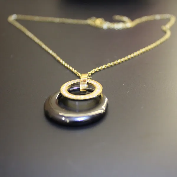 Gold_&_Black_Premium_Brass_And_American_Diamond_Neck_Pendant_For_Women