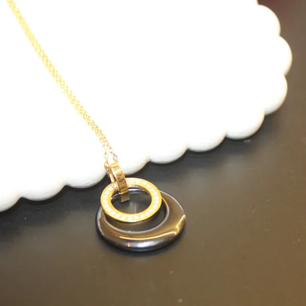 Gold_&_Black_Premium_Brass_And_American_Diamond_Neck_Pendant_For_Women