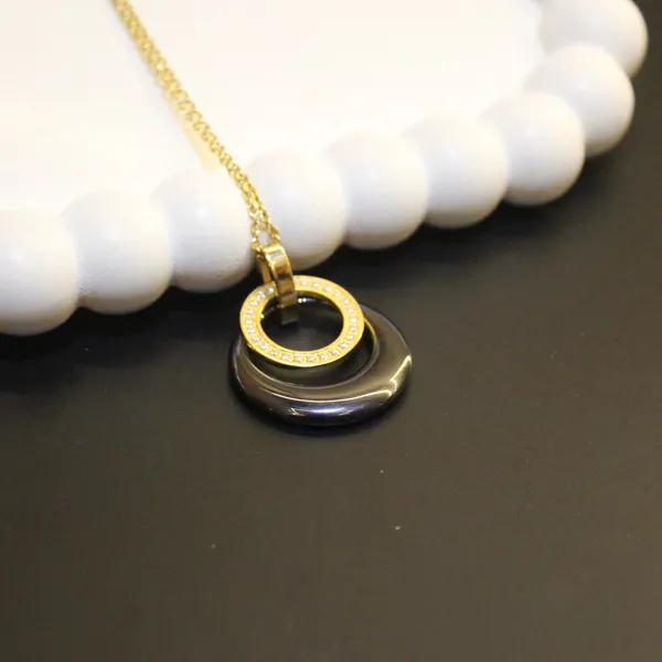Gold_&_Black_Premium_Brass_And_American_Diamond_Neck_Pendant_For_Women
