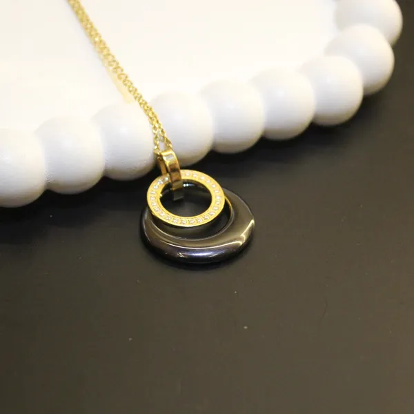 Gold_&_Black_Premium_Brass_And_American_Diamond_Neck_Pendant_For_Women