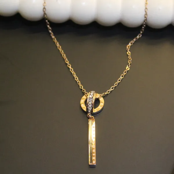 Golden_Premium_Brass_And_American_Diamond_Neck_Pendant_For_Women