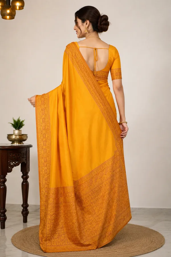 Mustard_Yellow_Silk_Saree_with_Intricate_Golden_Zari_Border