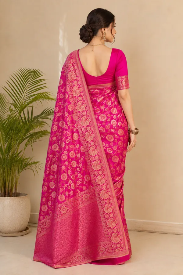 Vibrant_Pink_Banarasi_Silk_Saree_with_Golden_Floral_Zari_Motifs_&_Intricate_Traditional_Border